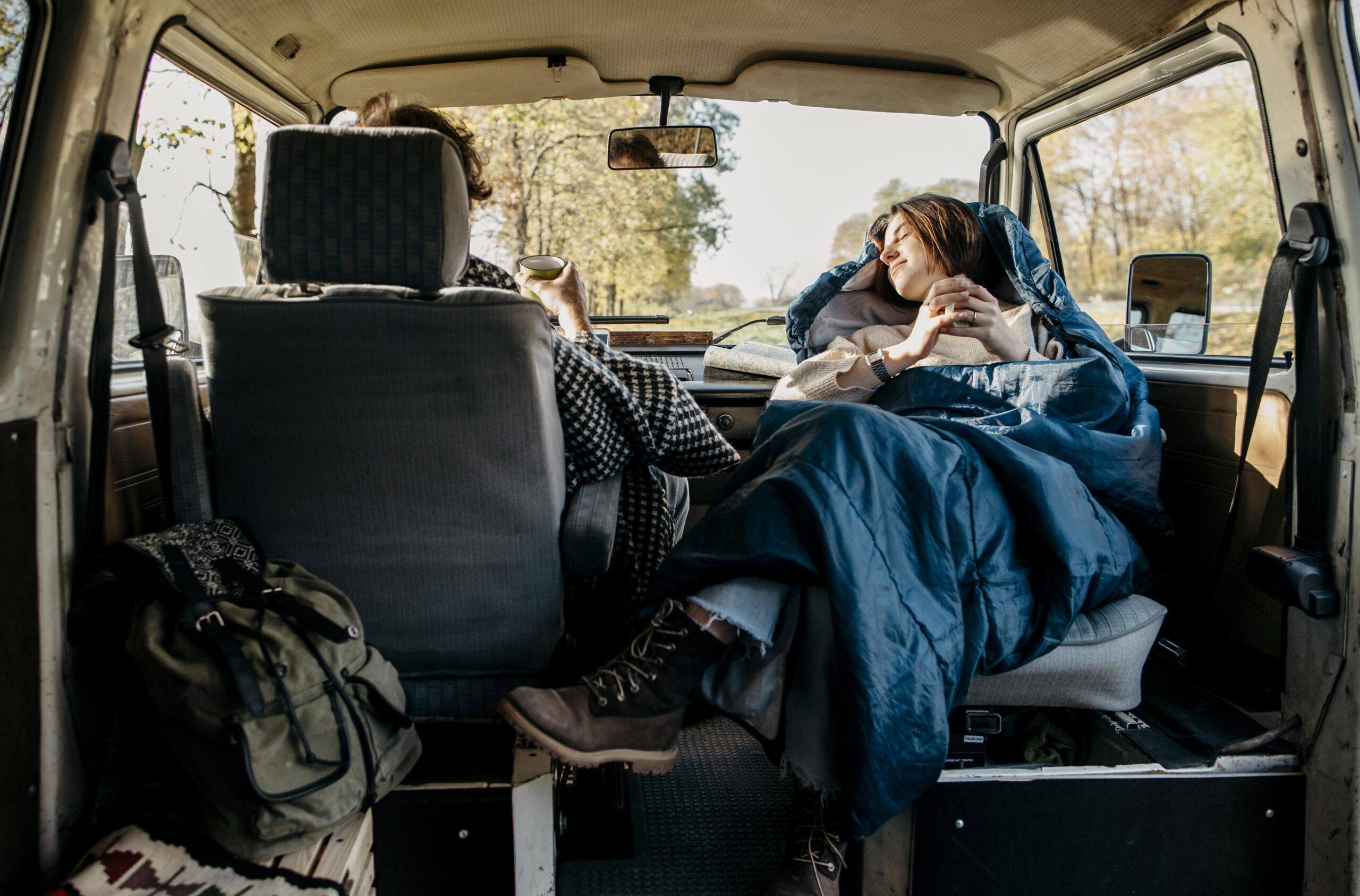 AZAR4 - couple having nice road trip van scaled - Top 5 Modifications That Will Increase Comfort in Your Camper